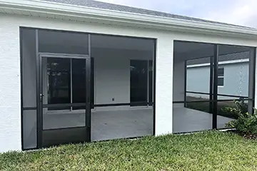 Screened lania under existing roof by East Coast Aluminum